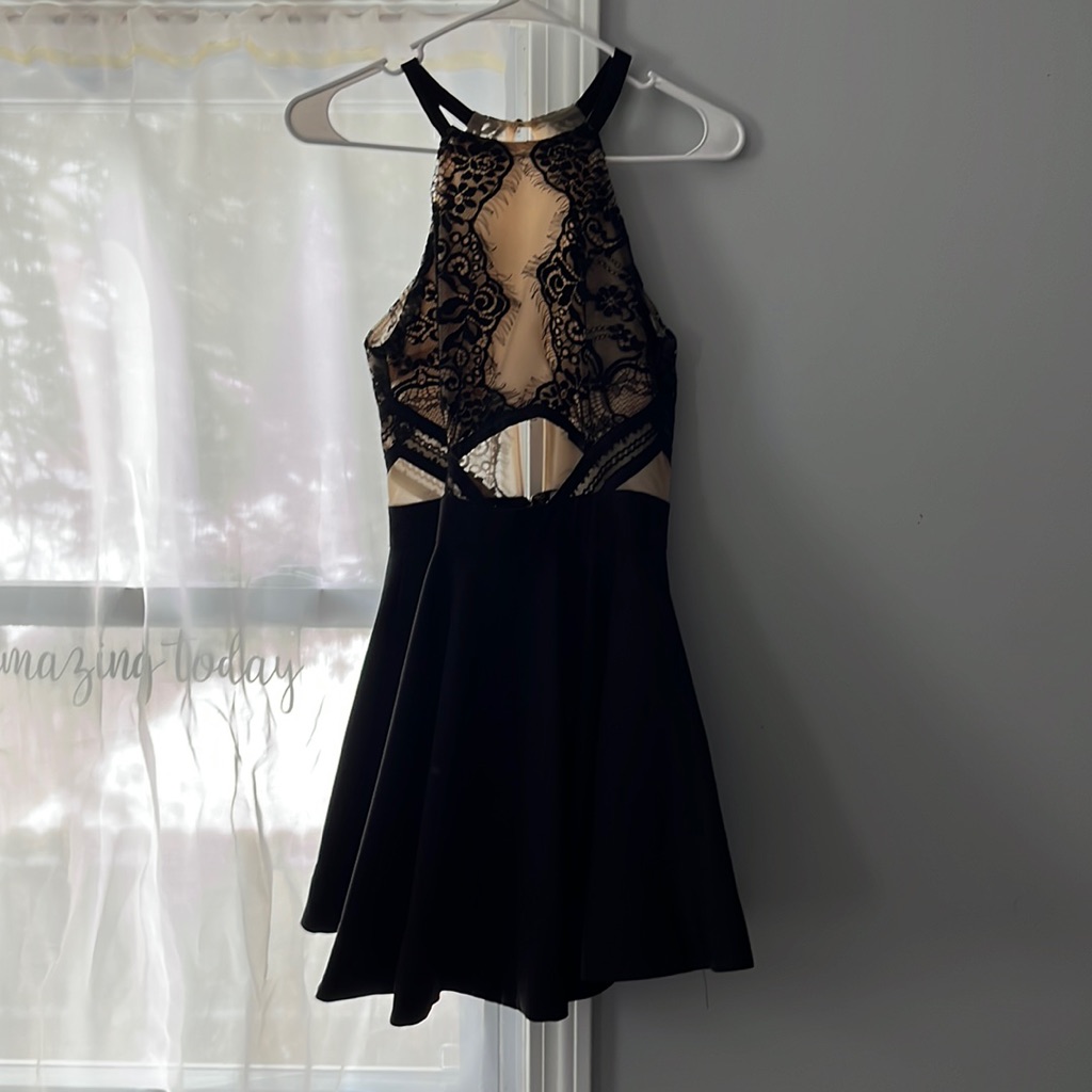Front Is Skin Tone Back Is See Through Flowy At The Bottom Very Pretty
